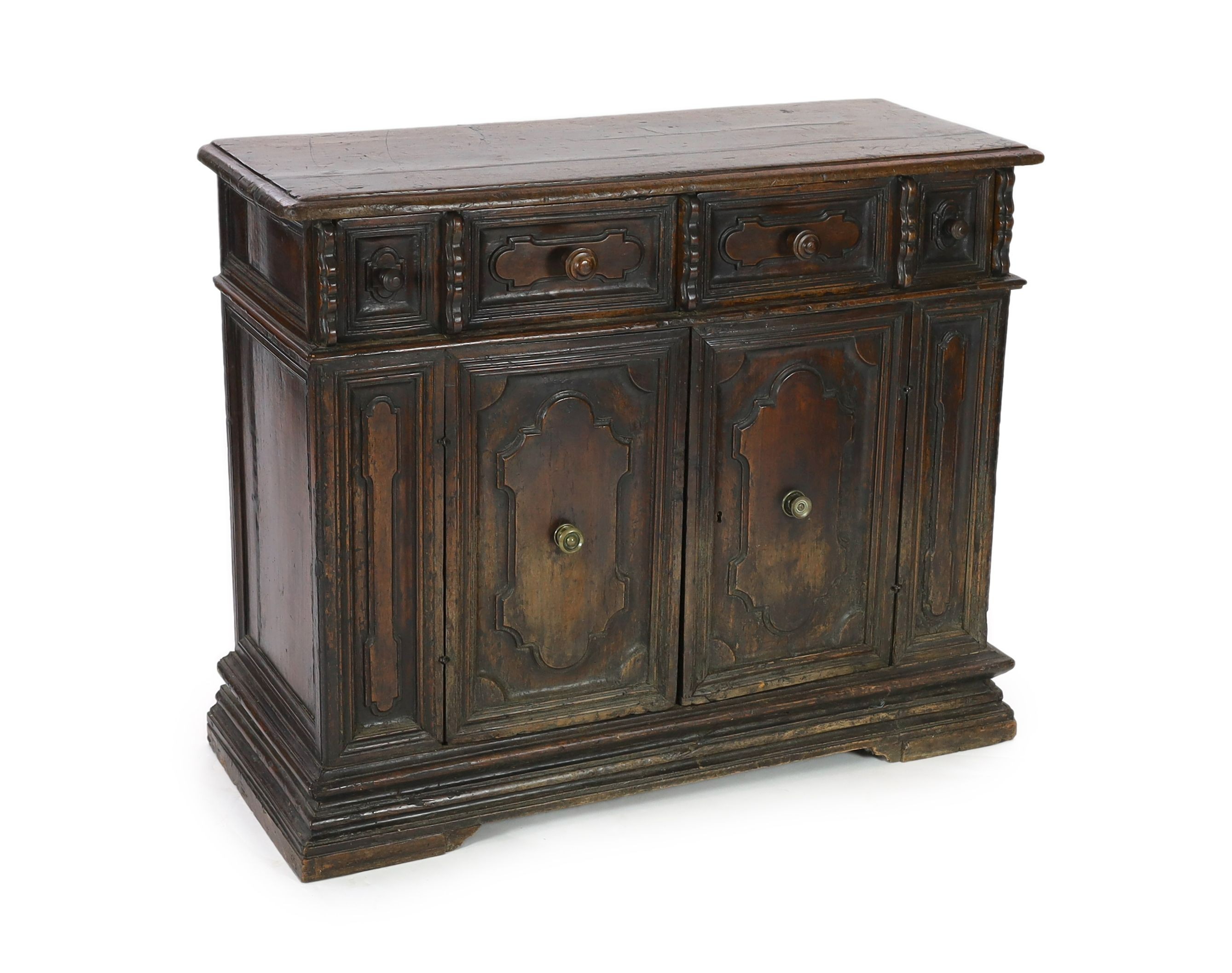 A 17th century Tuscan walnut credenza, W.131cm D.52cm H.105cm